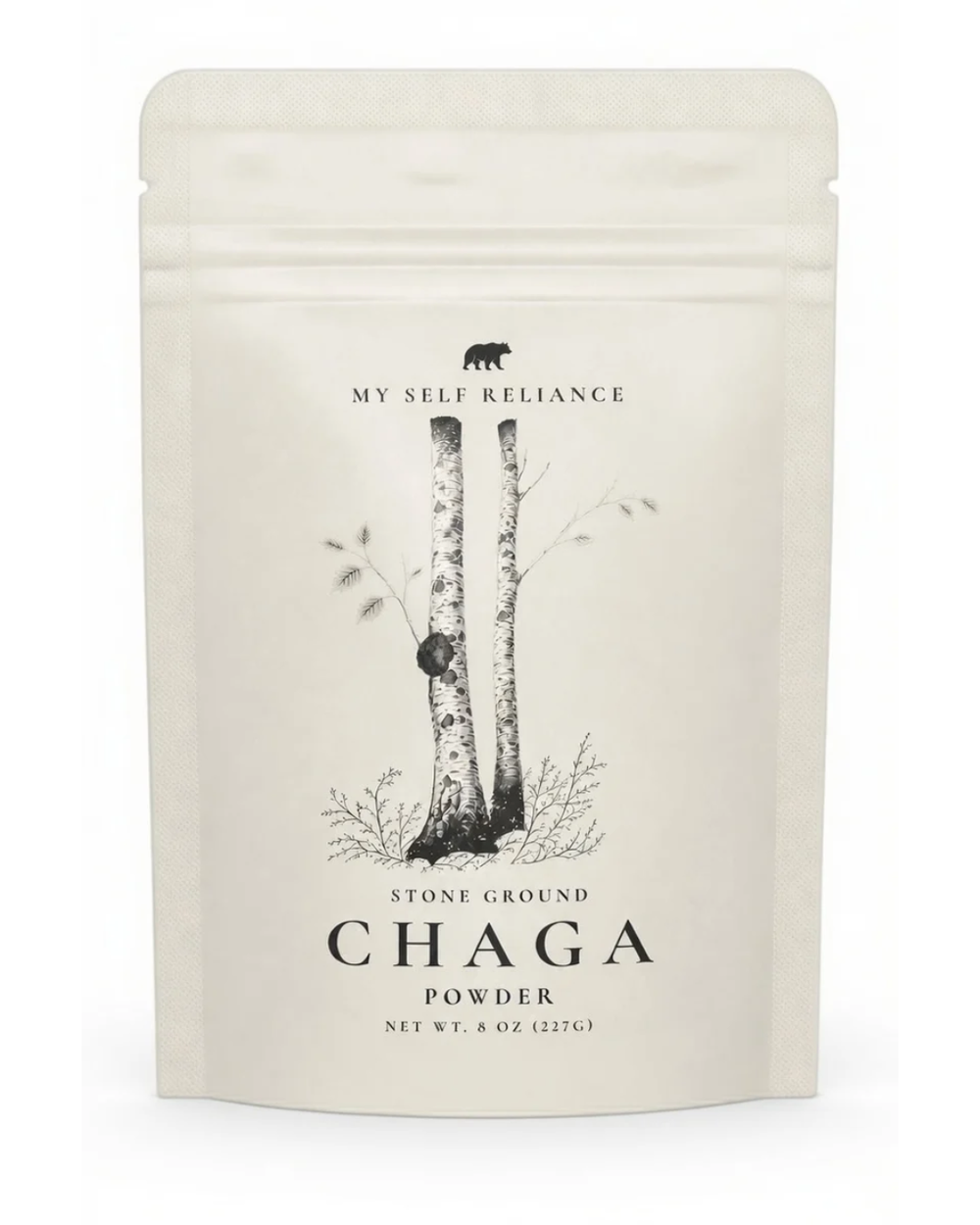 A 6 oz stand-up pouch of My Self Reliance Stone Ground Chaga Powder, featuring a minimalist black and white illustration of birch trees on a warm off-white background.